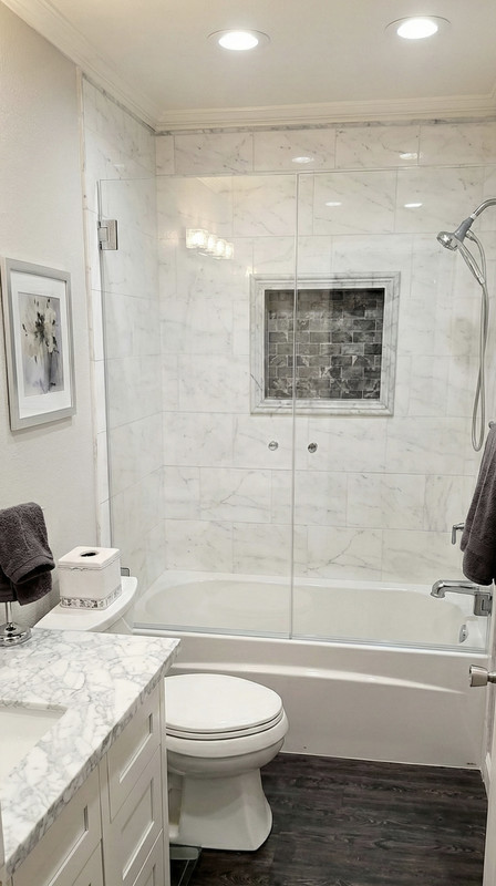 Spacious shower with modern fixtures