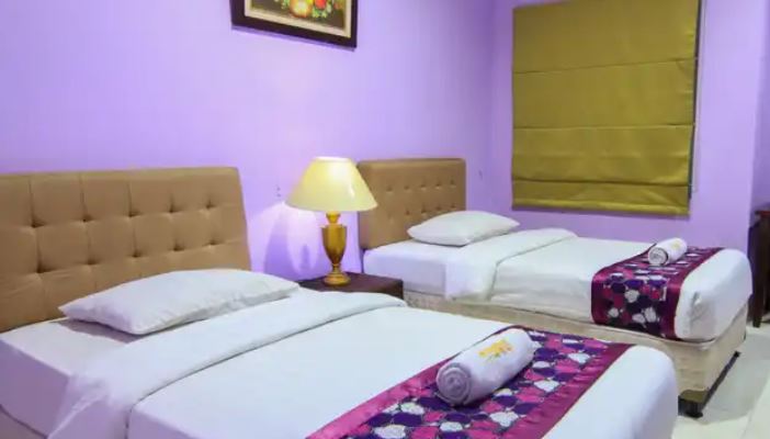 Kamar penginapan di Signature Hotel Mandala Kencana