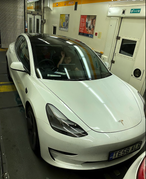 Tesla driving through the mountains