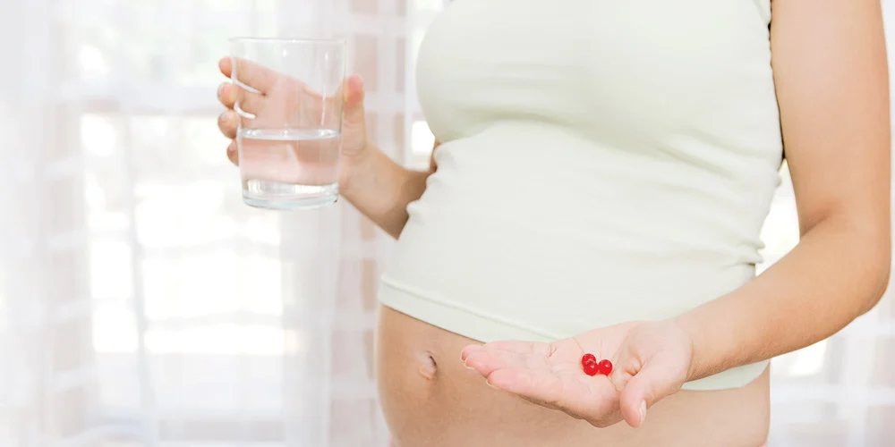 How do prenatal vitamins support pregnancy