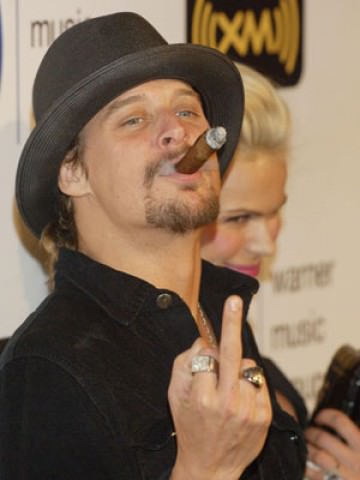 Kid Rock smoking a cigarette (or weed)

