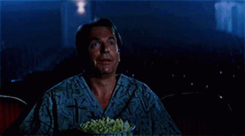 sam-neill-in-the-mouth-of-madness.gif