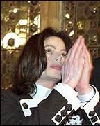 MJ-praying-michael-jackson-33406398-144-