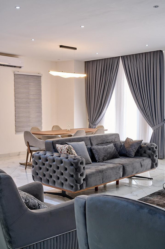 Interior detail — limewash, brass, iroko