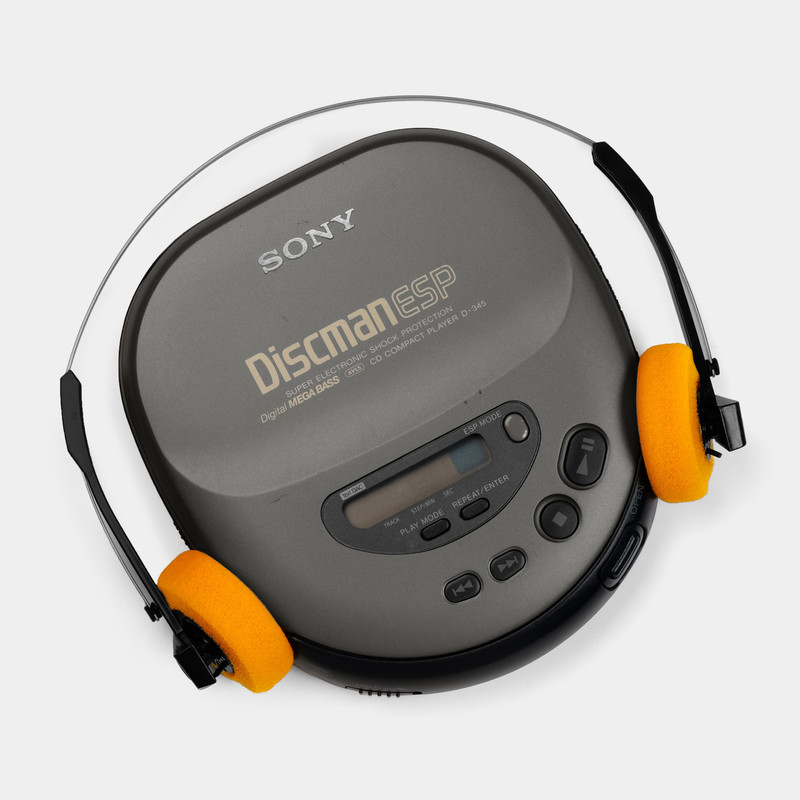Sony Discman with orange wired headphones