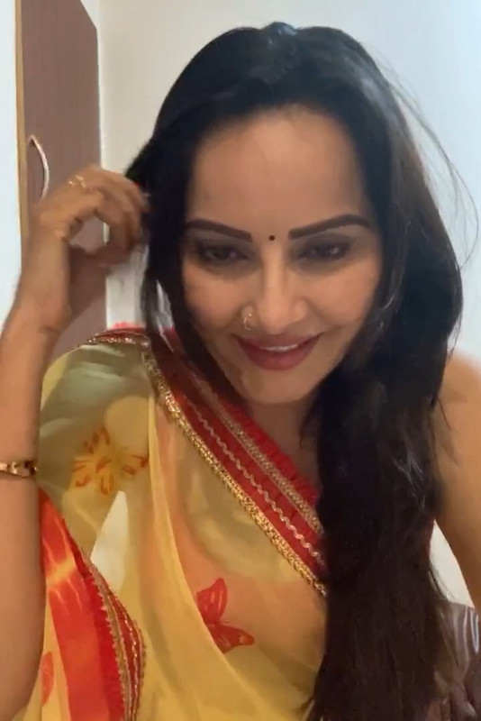 Geetanjali Mishra Sexy Cleavage and armpit though in Orange sleevless saree.mp4_snapshot_06.36.134
