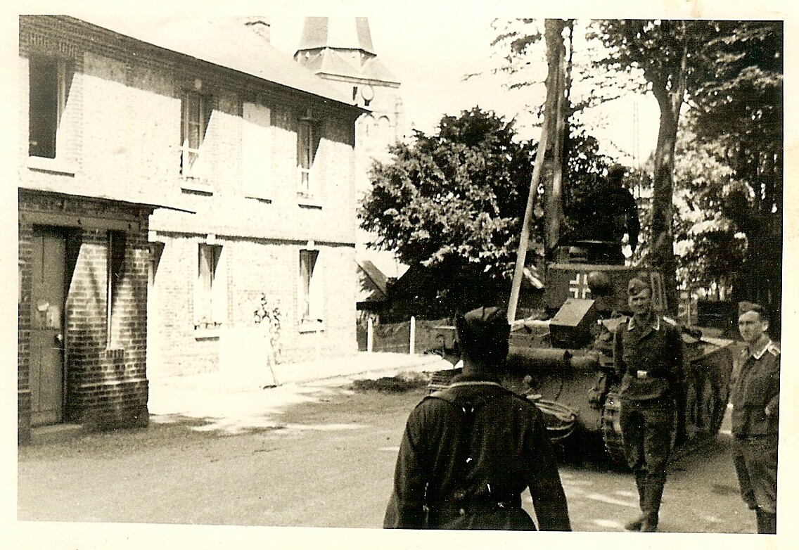 Luftwaffe Soldiers on Street by German Pzkw.38(t) Panzer