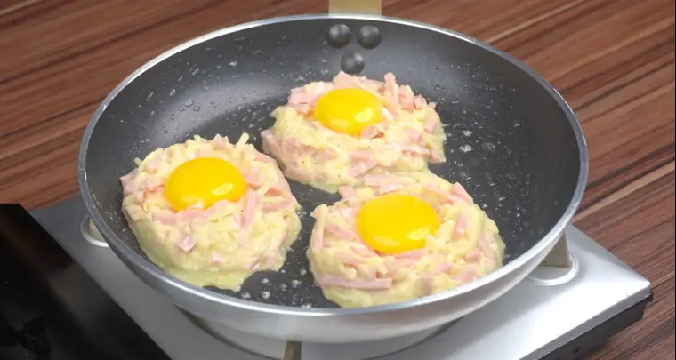 fried eggs in a pan