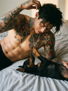 Man-and-Doberman-puppy-on-202605161747-1