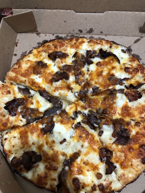 Medium pan pizza with light Alfredo sauce and Philly steak and cheddar