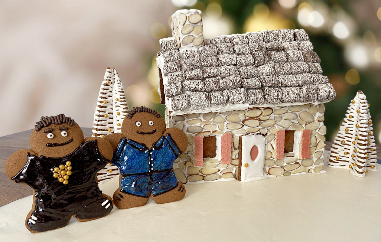 Gingerbread David and Patrick in front of the Rose-Brewer Cottage