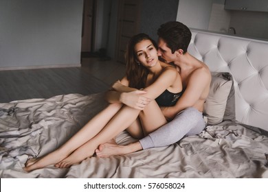 loving couple bed woman sitting 260nw 576058024