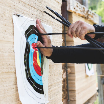 A man pulling arrows