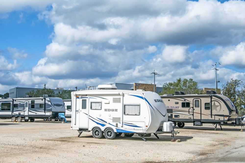 Outdoor parking is an affordable option, but take care to properly prepare your vehicle for long term external storage.