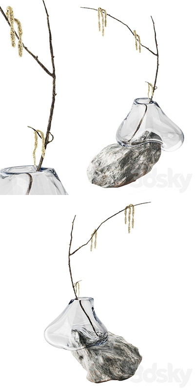 Branch with earrings in a sculpture vase by Laetitia Jacquetton