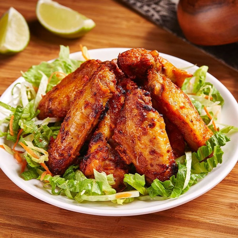 Chicken wings with salad
