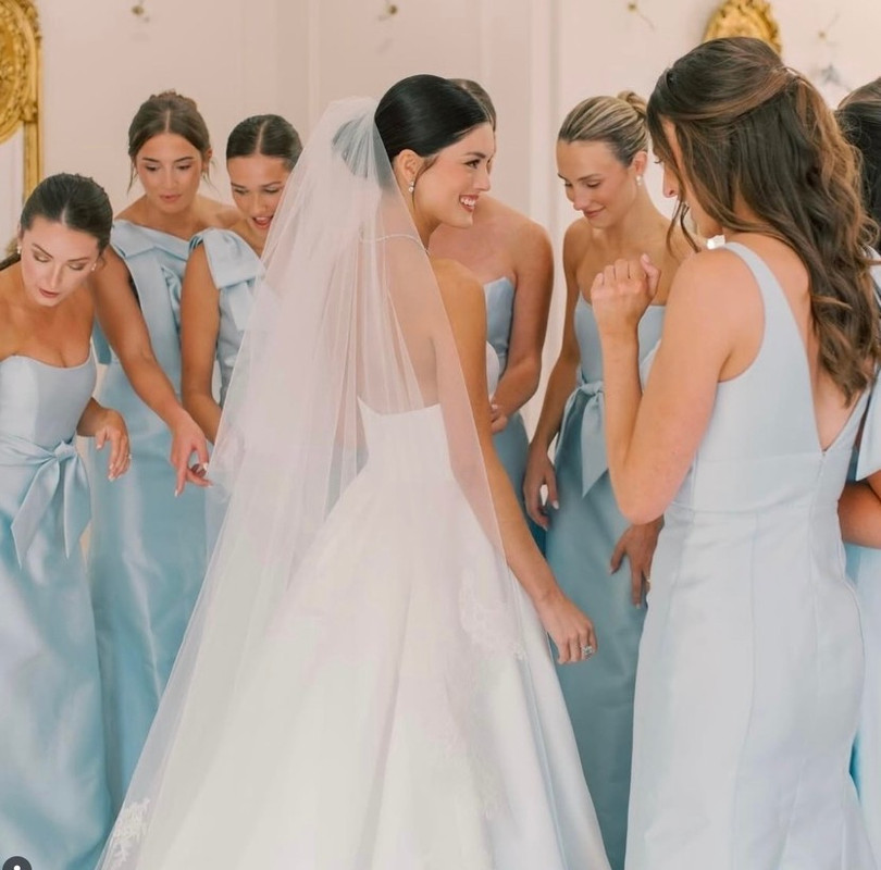 Bride with bridesmaids celebration