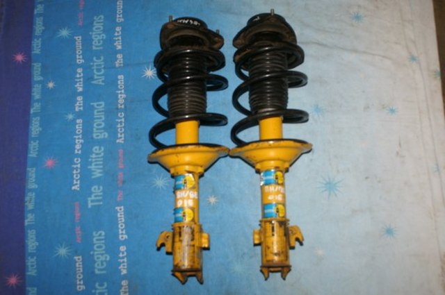 Стойки Субару