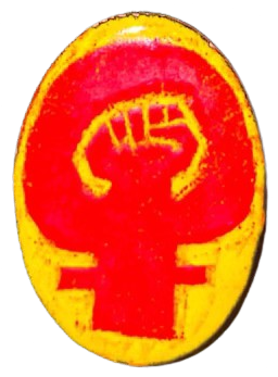 an enamel pin that's yellow with a red 'female' symbol with a fist in the center
