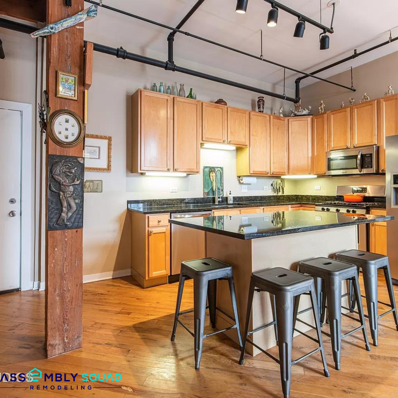 Before: Basic River North loft kitchen with limited functionality and outdated style