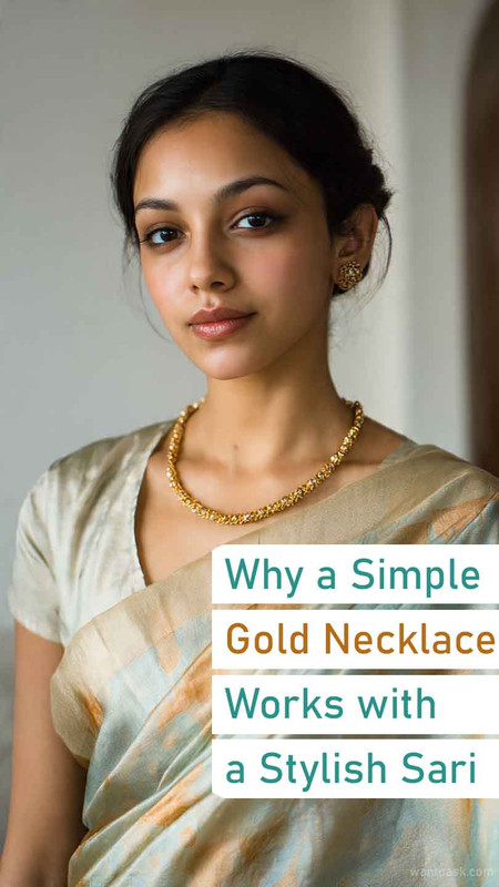 Simple gold necklace works with a stylish sari