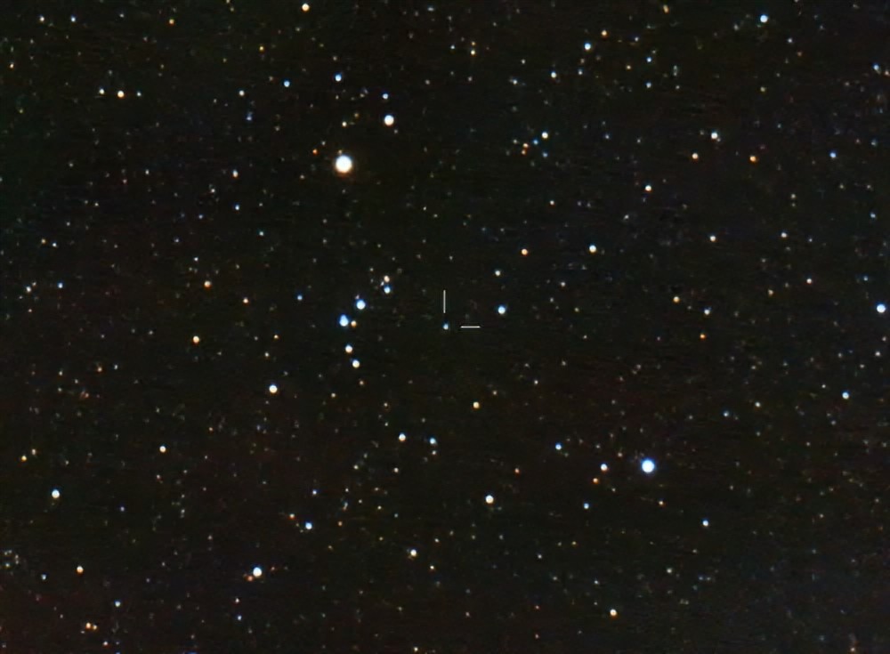 Plut�n en campo estelar en un telescopio de aficionado