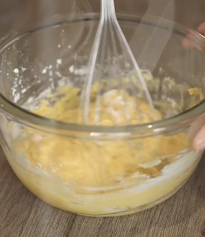 Batter being mixed and divided into four bowls