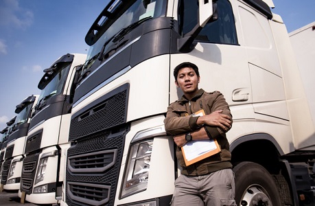 portrait-asian-truck-driver-standing-wit