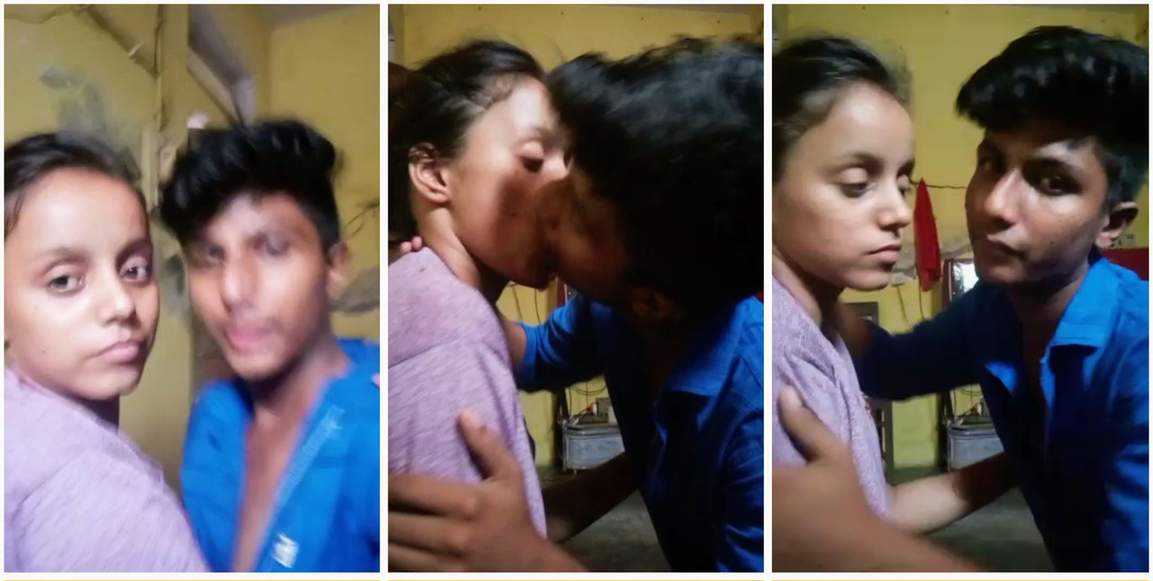 indian girl kissing with boyfriend in home
