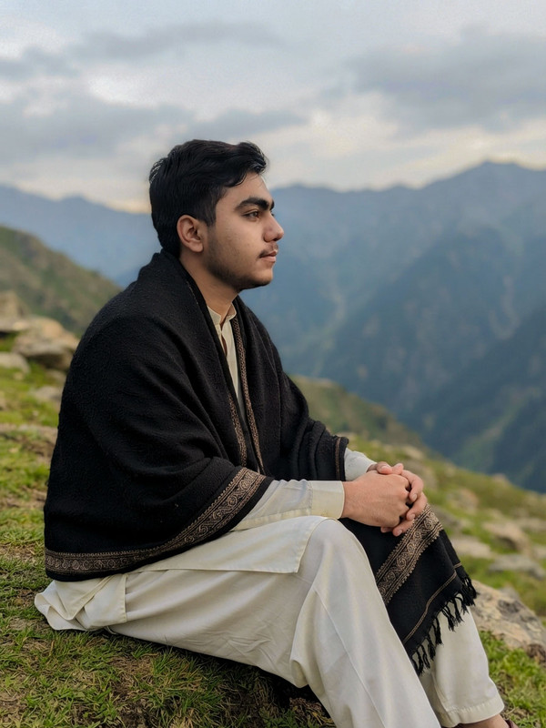 AI-generated example result for the creative-images prompt: Outdoor Mountain Traditional Attire Portrait Prompt by Prompt Craft
