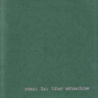 [Slika: Man-In-The-Shadow2001-folder.jpg]