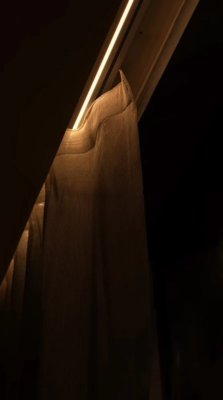Illuminated curtain rail seen from below
