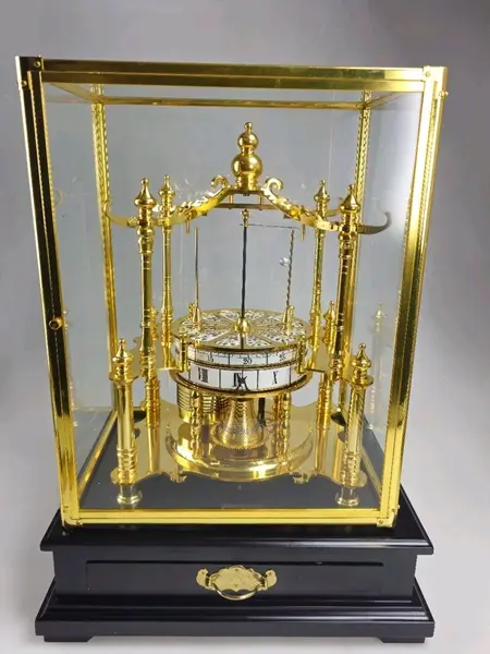 clock-pendulum-gold.webp