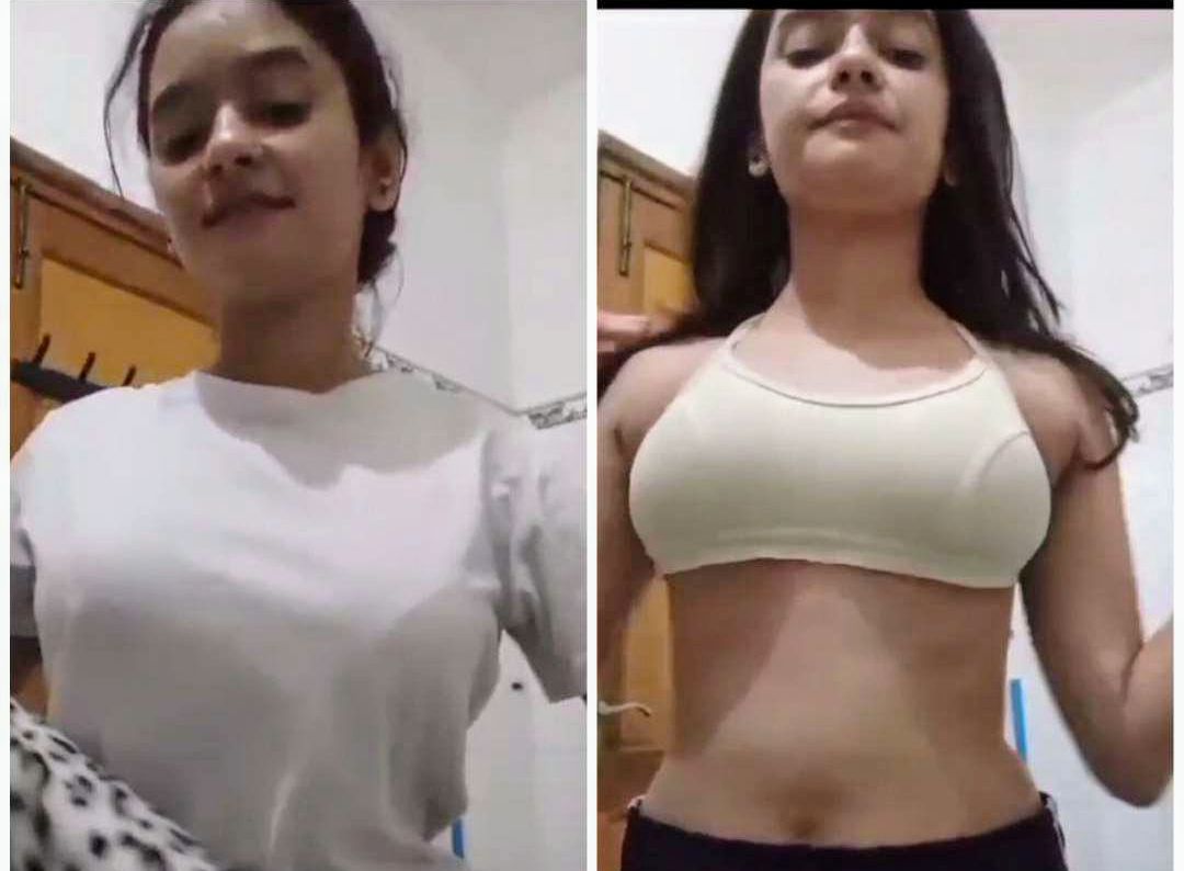 Beautifull girl removing her clothes and rubbing her pussy