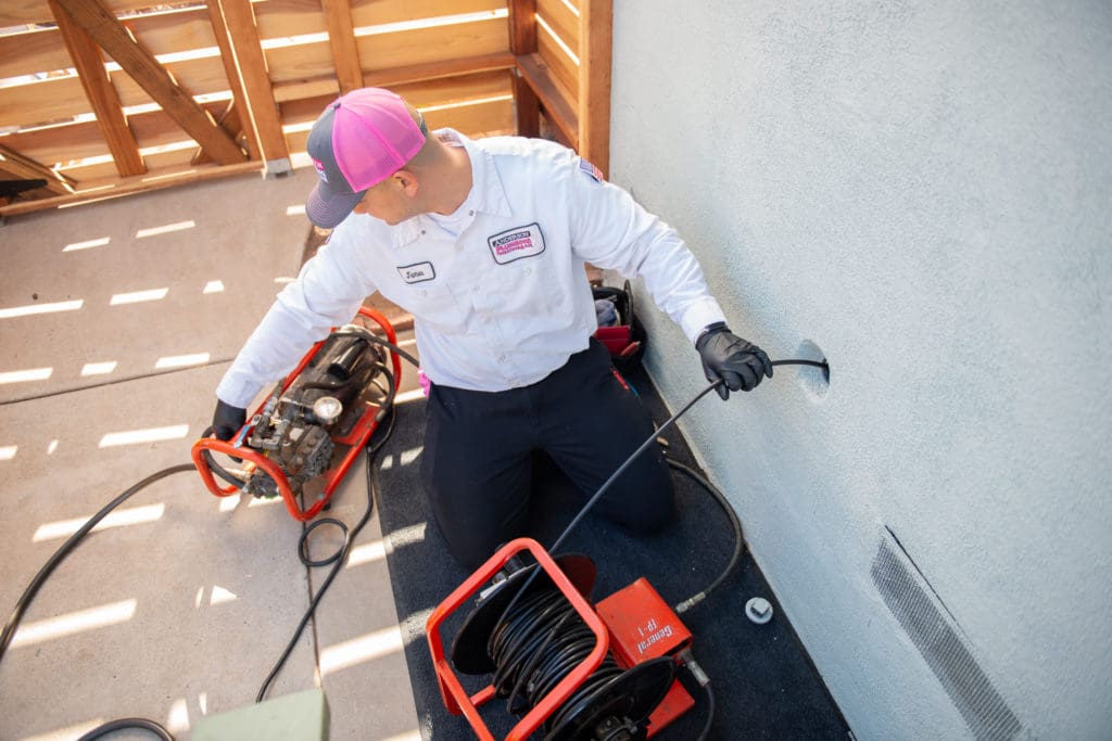 Hydro jetting drain cleaning clog removal process in Albuquerque home