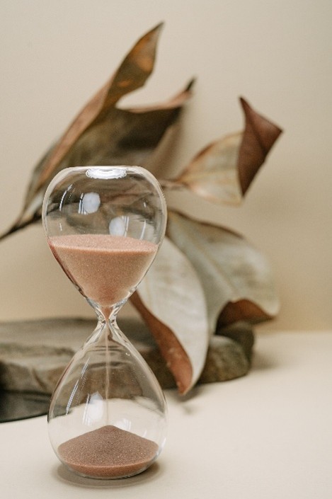 An hourglass — time always trickling
