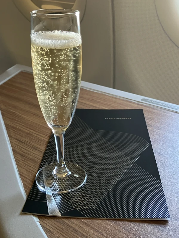 Flagship First pre-departure champagne