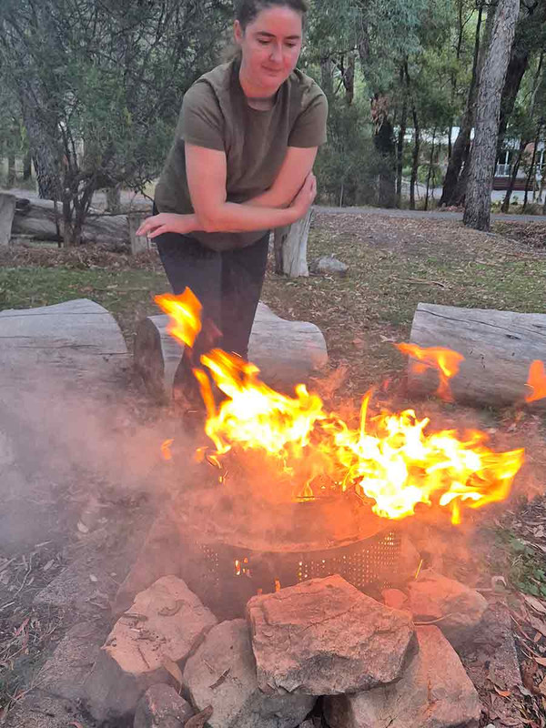 Kelly helps get the fire going