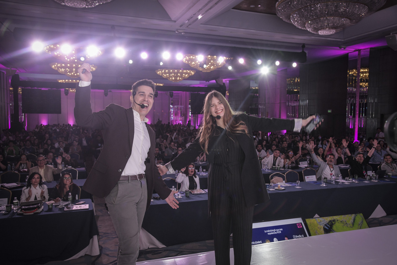 Mica Beleni on stage delivering a keynote