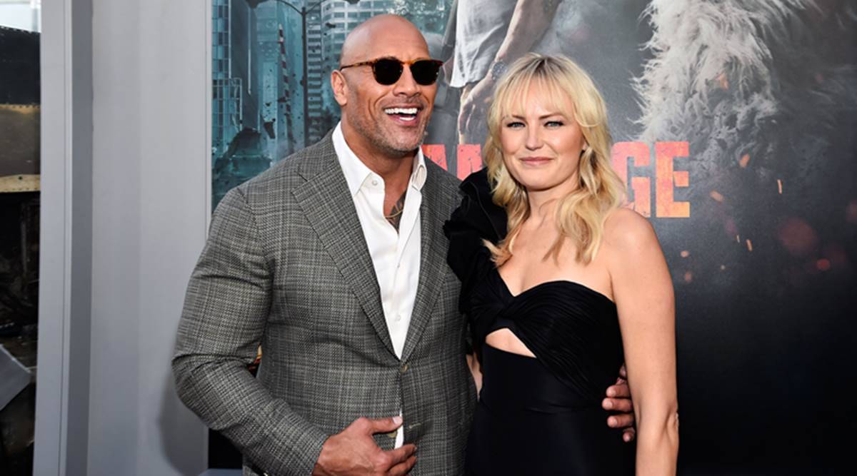 Malin with Dwayne Johnson for the promotion of their movie Rampage