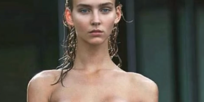 A Gorgeous Girl Sitting Naked, Boobs On Full Display, And Something Leaking From Her Mouth.