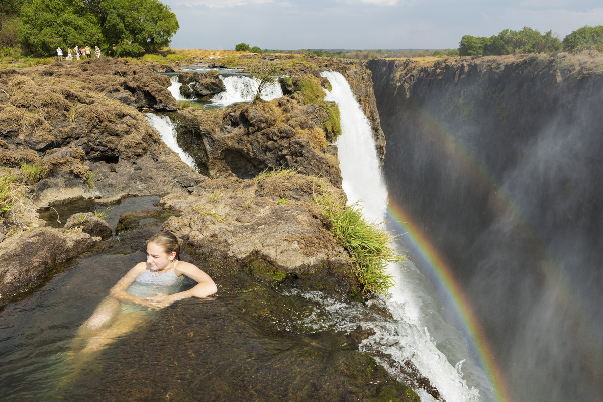 Traveler in the Devil’s Pool at Victoria Falls