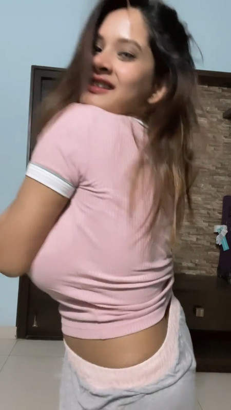 Hot Sexy Desi Girl Huge Tits and navel in pink tshirt and trousers.mp4_snapshot_00.17.808