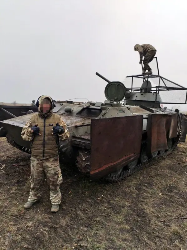 russian-mt-lb-armed-with-a-bmp-1-turret-also-sporting-yknow-v0-xl5jut7n2byb1.webp