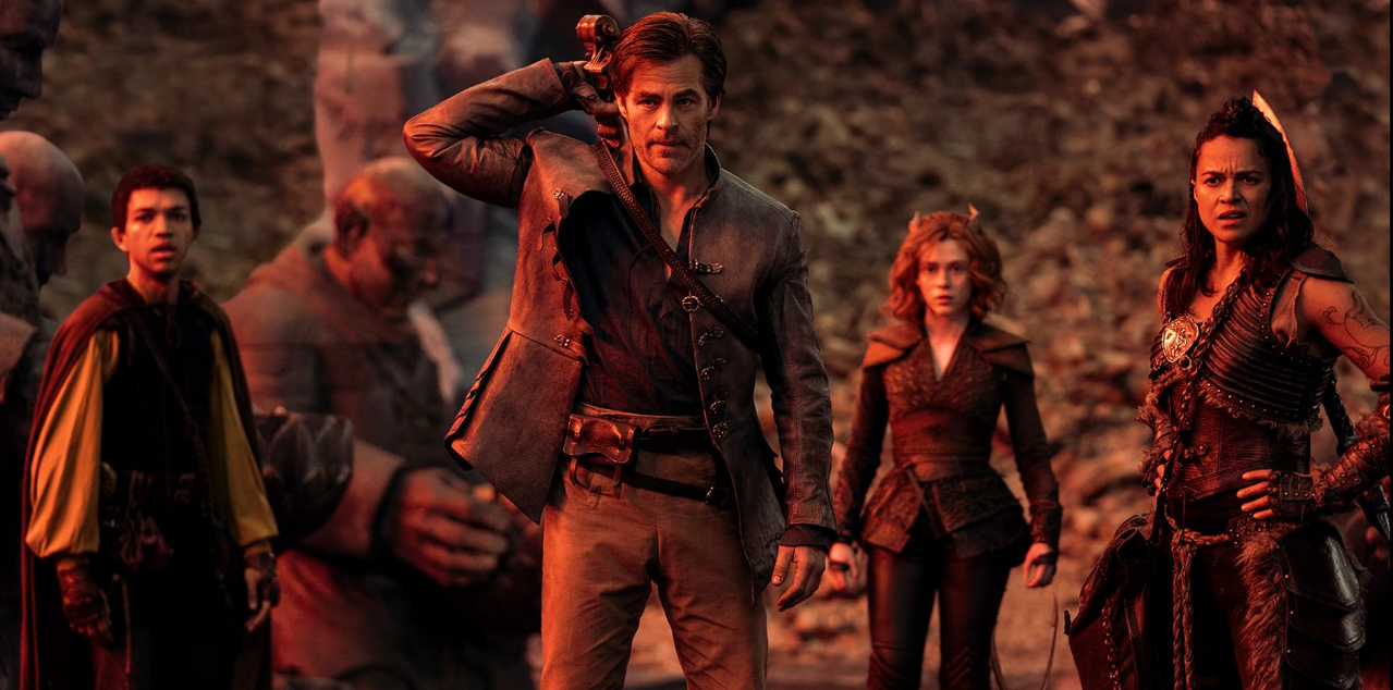 The heroes of Dungeons & Dragons: Honor Among Thieves stand together facing something off camera.