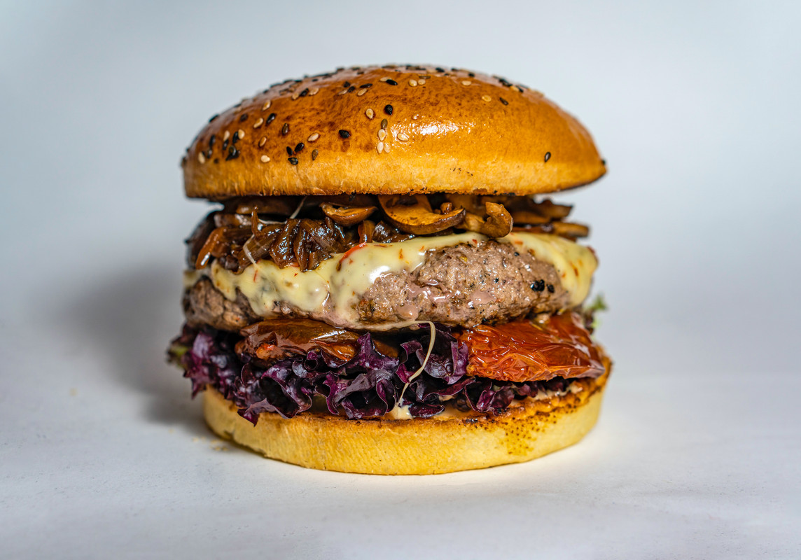 Double-stacked cheese and bacon burger