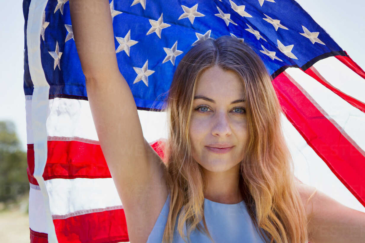 portrait-of-woman-with-american-flag-CAVF41361.jpg