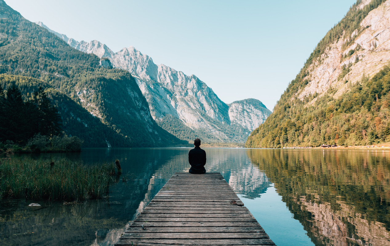 man sitting in the bench