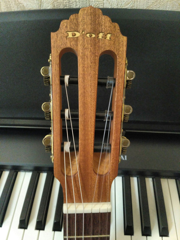 Головка грифа