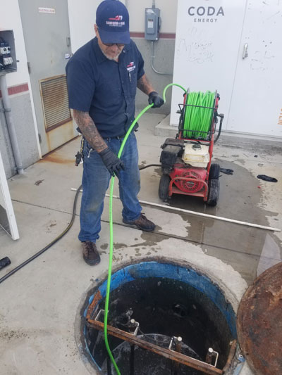Hydro jetting plumbing technician high pressure water jetting Albuquerque